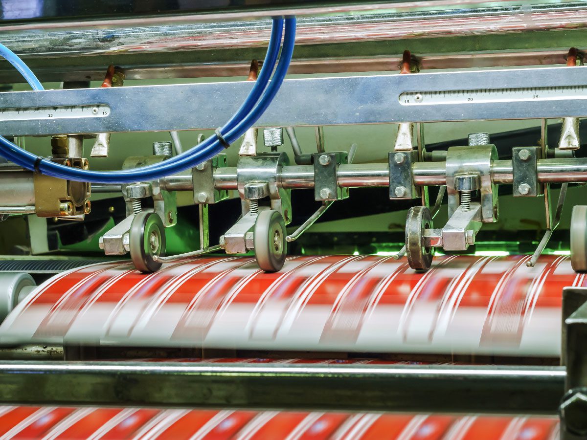 Industrial label printing equipment producing compliant product packaging labels