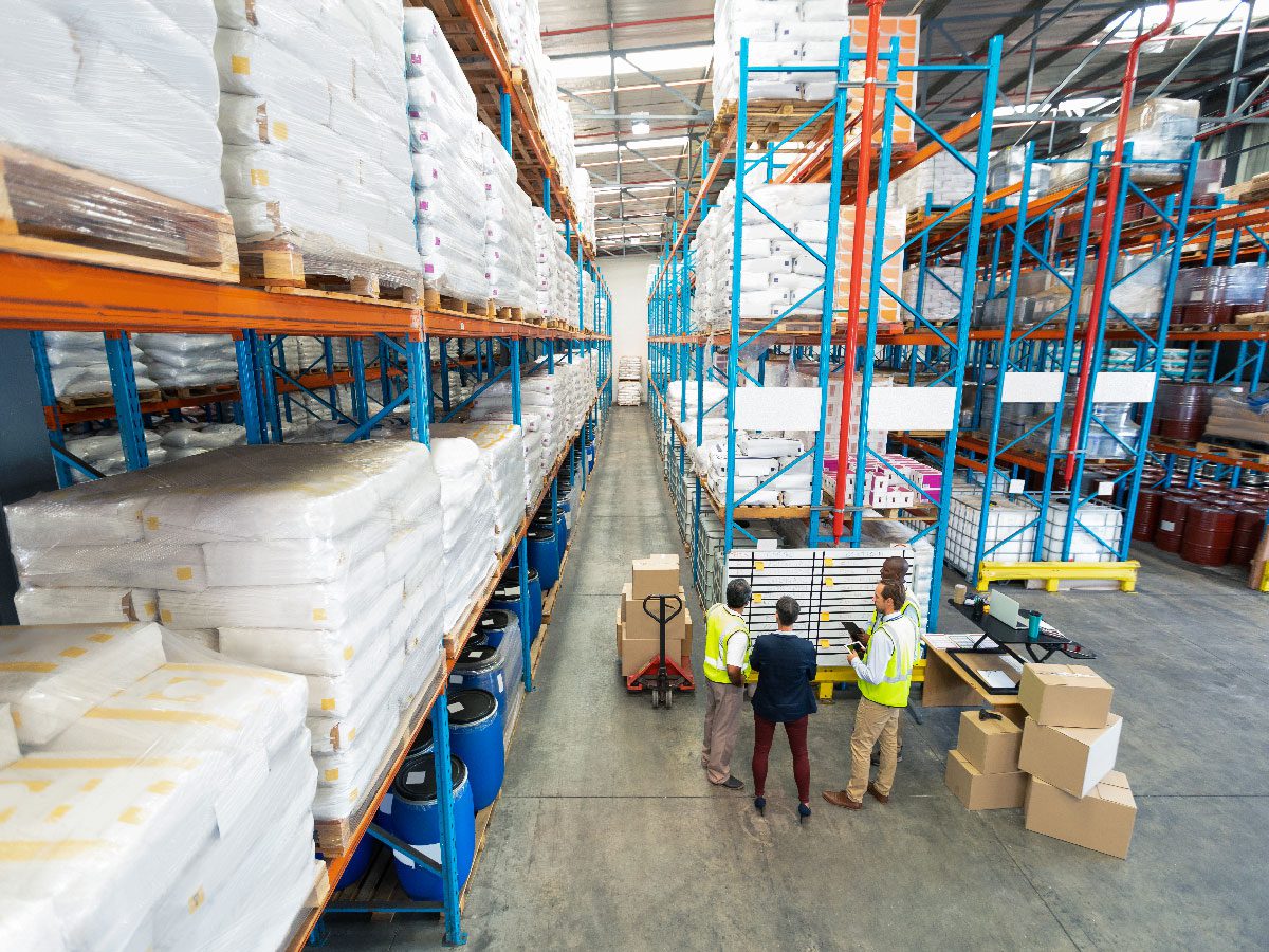 Operations team collaborating on warehouse planning and logistics coordination